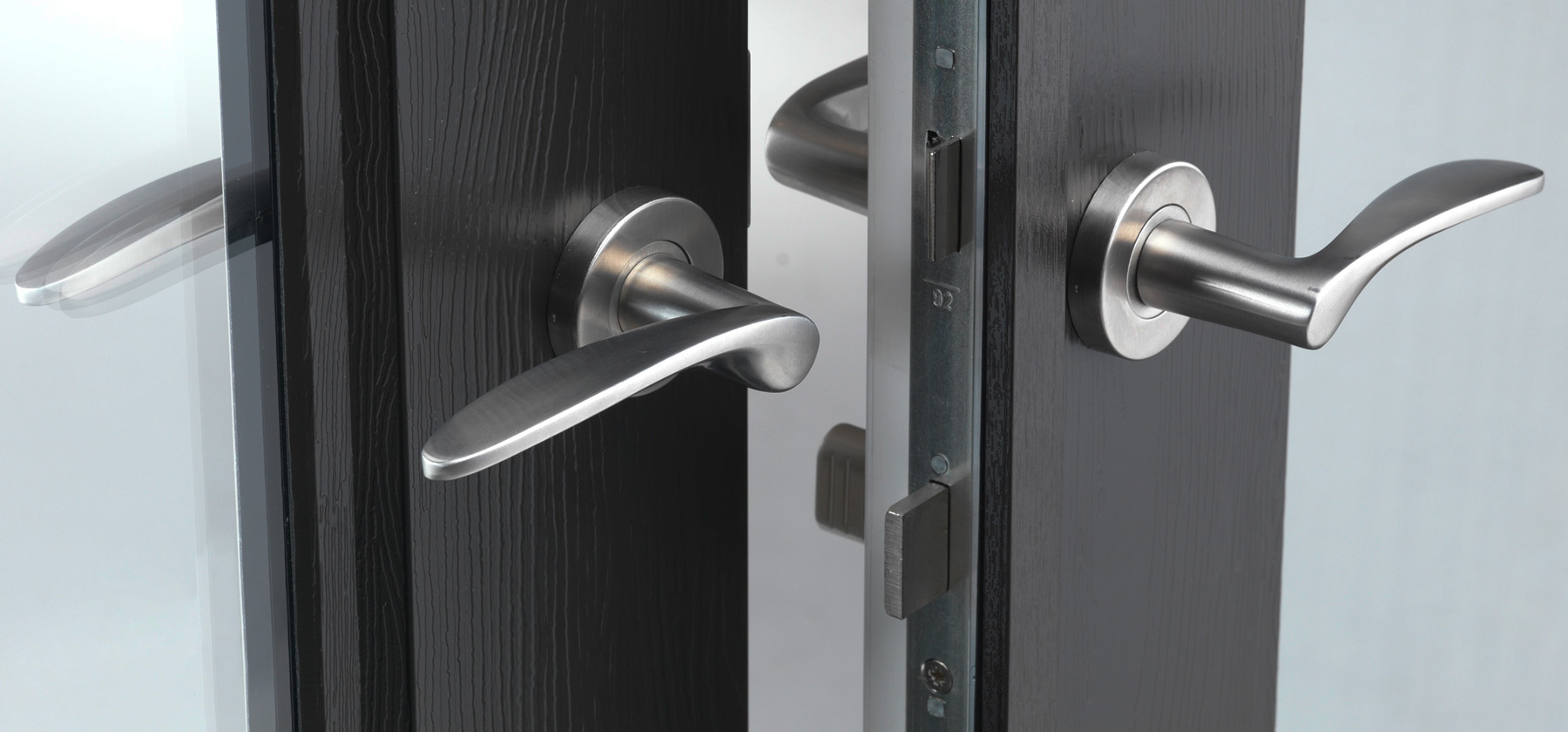 A professionally installed high security door lock on a residential front door